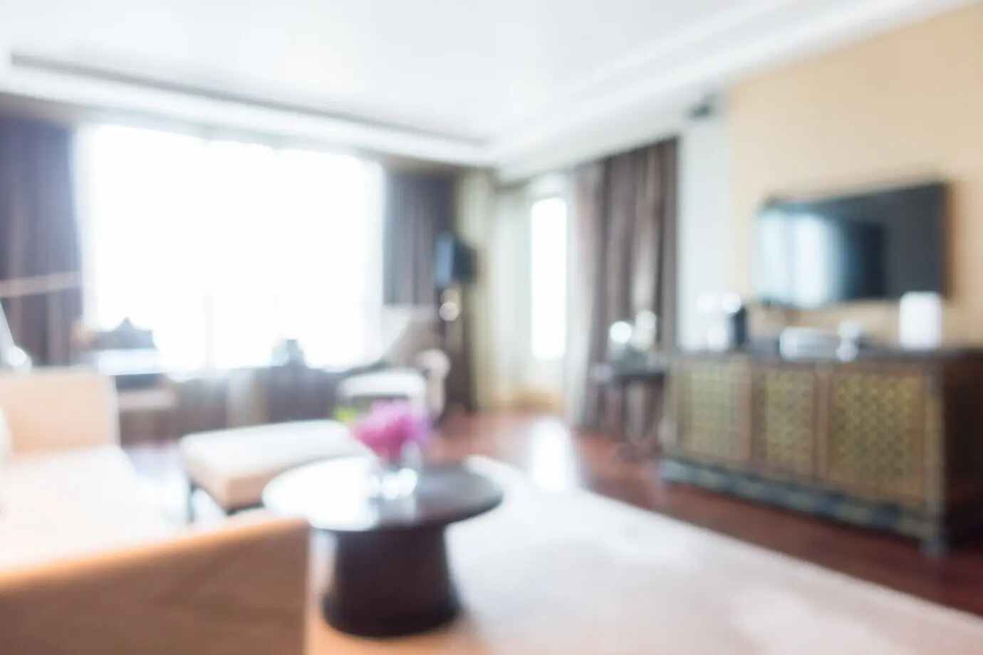 Neat living room with a large television